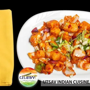 Chilli Paneer (Homemade cheese tossed with onions, bell peppers, finished with hot tangy soy and chili sauce.) Utsav Philly