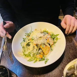 a man eating a salad