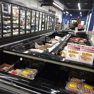 a deli case filled with food