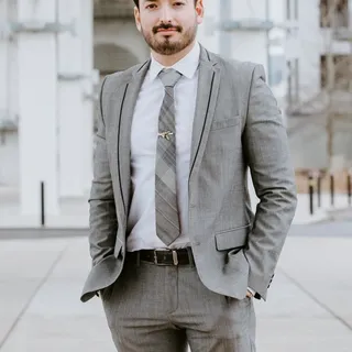 Kristopher E.