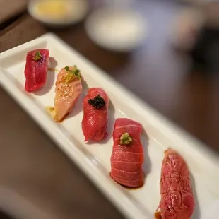 a plate of sushi on a table