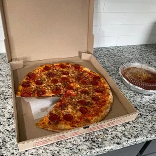 Sorry couldn't wait had too eat a slice first before pic  -Meat lovers &amp; Chicken Parm with spaghetti