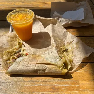 Burrito fell apart as I opened it. They microwaved it in the wax paper.