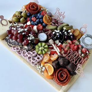 a platter of fruit and cheese