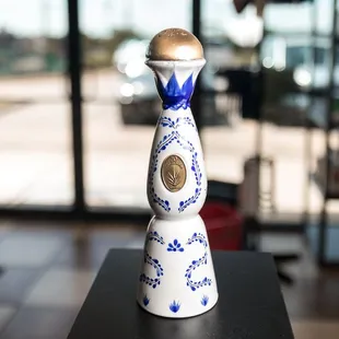 a blue and white vase