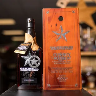 a bottle and a wooden box