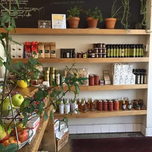 Front of shop with a variety of jams and sauces for sale.