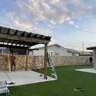 a man working on a patio