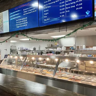 a buffet with a variety of food items