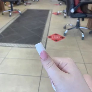Incorrectly filed thumb nail- bulky and thick