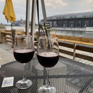 two glasses of wine on a table