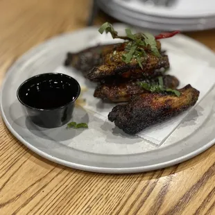 a plate of food on a wooden table