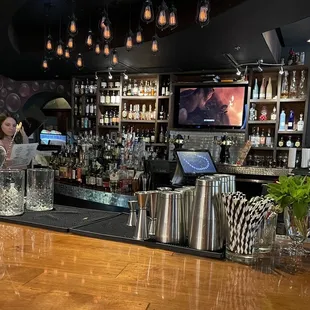 a woman behind the bar