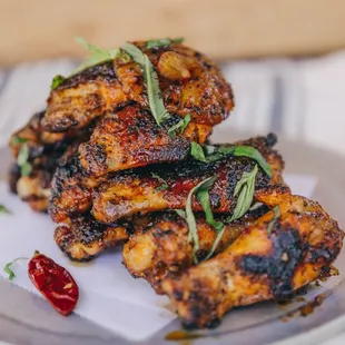 CRYIN&apos; HAWAIIAN WINGS -V marinated wings, V hawaiian sauce (think honey &amp; calabrian pepper paste), fresh basil