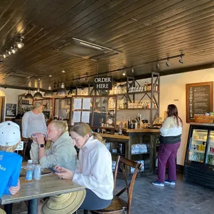 a group of people sitting at a table