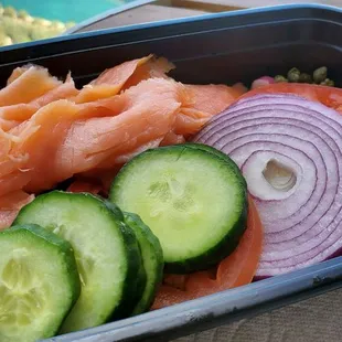Smoked salmon breakfast setup for bagel Capers are underneath there somewhere as well