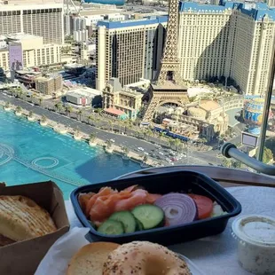 Smoked salmon breakfast setup with bagel and cream cheese