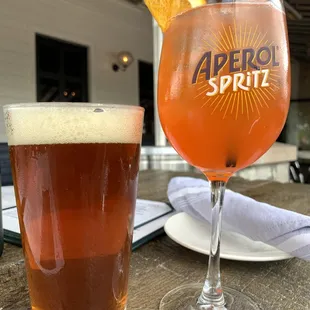 a glass of aperol spritz
