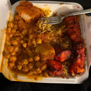 Chicken kabob with potatoes and chick peas.