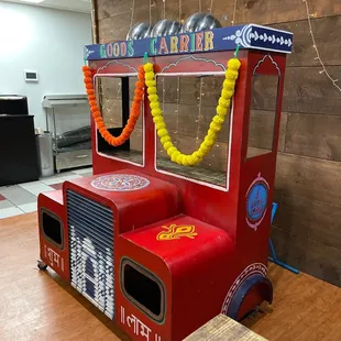 a toy truck made to look like a carnival
