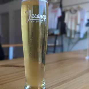 a glass of beer on a table