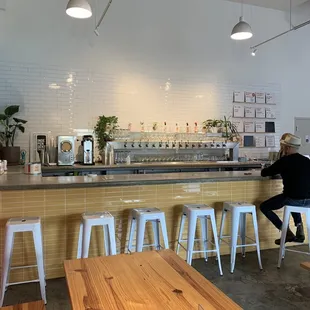 two people sitting at the bar