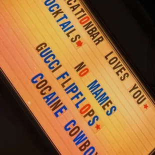 a neon sign for a bar