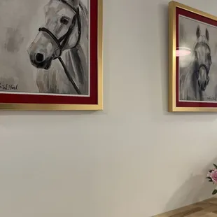 a painting of a horse and a vase of flowers