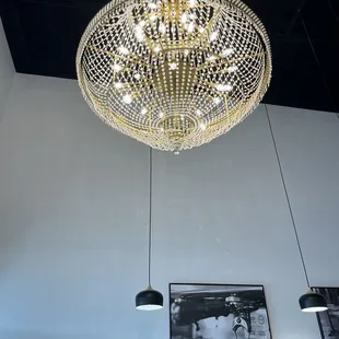 a chandelier hanging from the ceiling