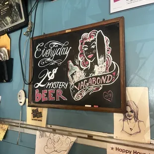 a blackboard with a drawing of a woman on it