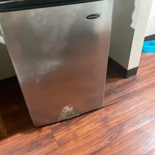 Damaged mini fridge