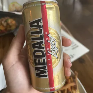 Medalla Beer (Happy hour price $4)