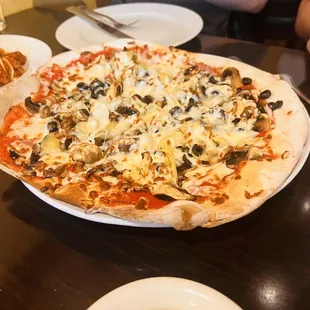 Sausage, artichoke, olive pizza