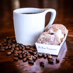 a cup of coffee and a donut