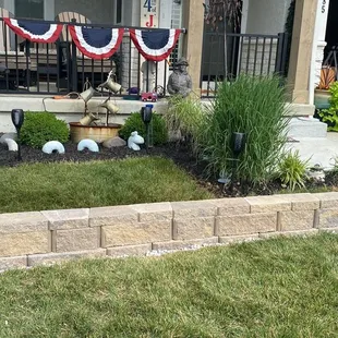 a front yard with a lawn