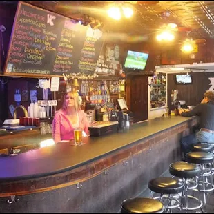 As you enter the restaurant, the first thing you'll see is the large wraparound bar, and lots of "old school" bar stools.