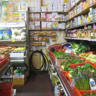 pantry staples stacked up to the ceiling, every little nook and cranny in this space is full