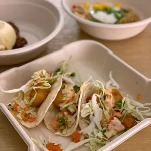 a plate of tacos and a bowl of ice cream