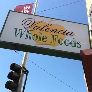 a sign for a whole foods restaurant