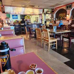 Taqueria side dining area - sweet bread case behind photographer
