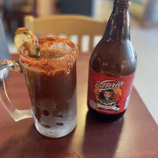 Ice cold michilada while I wait for my fresh tray of beans and rice.