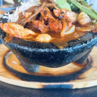 Molcajete came with rice and beans and fresh made tortillas.