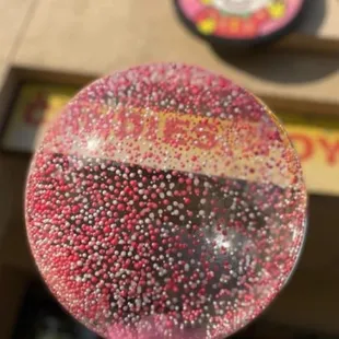a pink and black balloon
