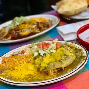 two plates of mexican food on a table