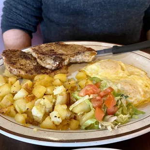 The Special of the day, Pork Chops came with two perfect eggs &amp; perfectly cooked potatoes :)...