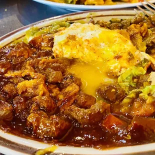 moi topped my carne asada enchilada with the perfect egg, ate it with the most incredible Sopapilla! :)...
