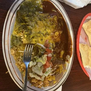 Tres enchiladas meal, chicken, beef and cheese. We finally found some flavor in Santa Fe.  Great service &amp; atmosphere.