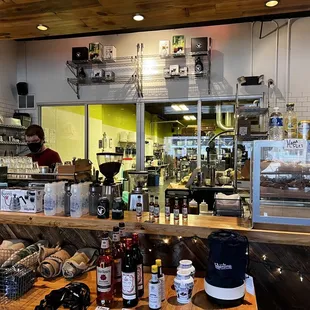 Merch for sale and a view of what I believe to be the roasters.