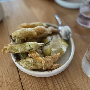 Tempura squash blossoms, yuzu goat cheese, tomatillo, pine-agave syrup ($18)