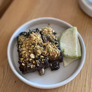 pork ribs, sarsaparilla glaze, chayote slaw, az snack mix ($21)